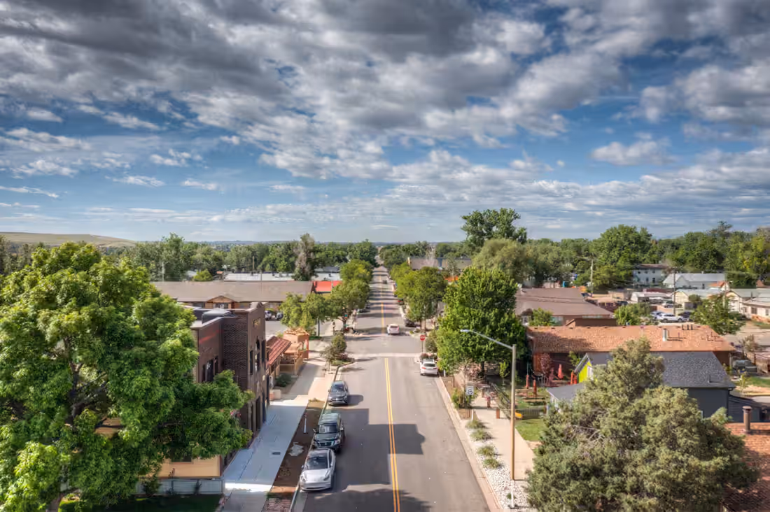 Old Town Erie's main street from the air with the plains beyond