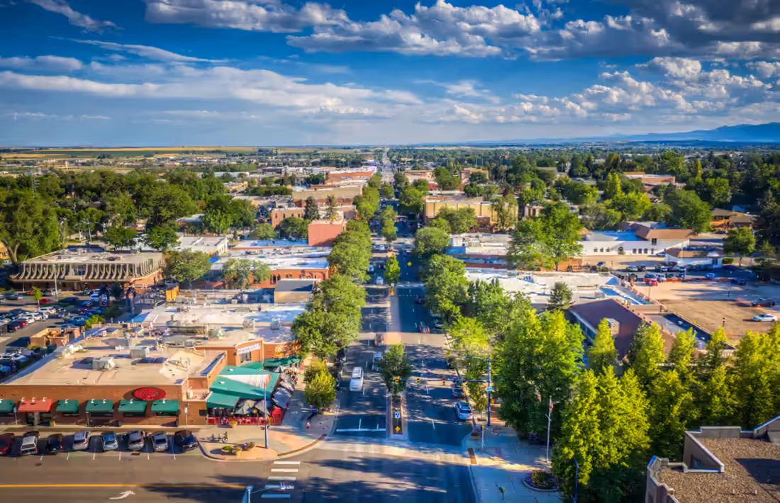 Main Street from above, the plains and distant foothills beyond