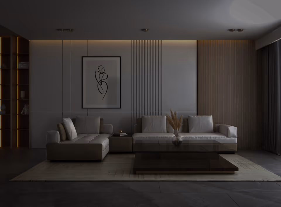 Sparsely furnished living room lit low, with a slatted wood wall and a single framed print